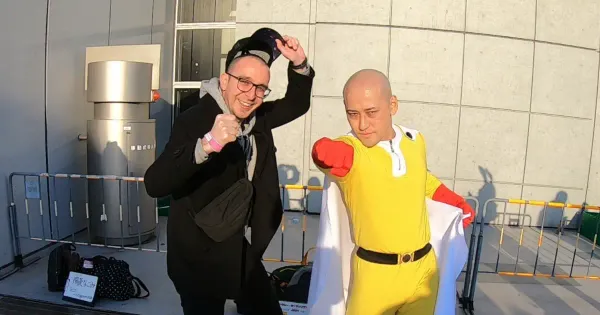 bald man posing with his favorite bald anime character